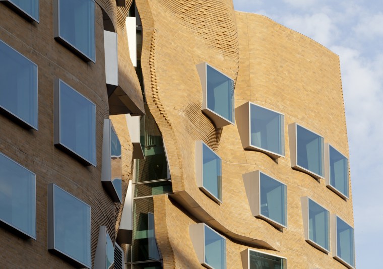 Materials on the Dr Chau Chak Wing Building apartment, architecture, building, commercial building, condominium, daytime, facade, house, mixed use, real estate, sky, window, orange
