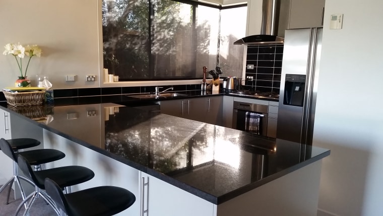 Before image of a U-shaped kitchen that countertop, home appliance, interior design, kitchen, gray, black
