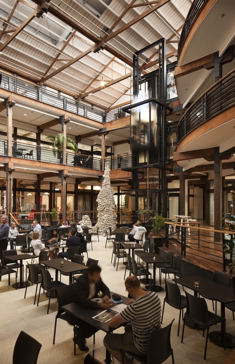The Saatchi & Saatchi building in Auckland has café, interior design, restaurant, black, brown