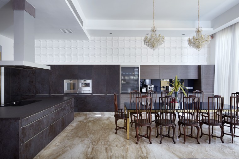 Marble flooring helps to bring nature inside. countertop, floor, flooring, interior design, kitchen, real estate, room, gray, black, white