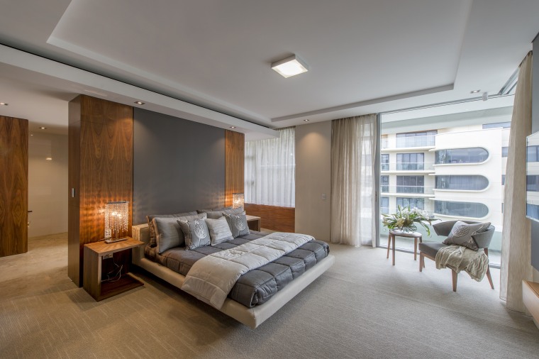 Running parallel to the living spaces, this master bedroom, ceiling, floor, interior design, real estate, room, window, gray, brown