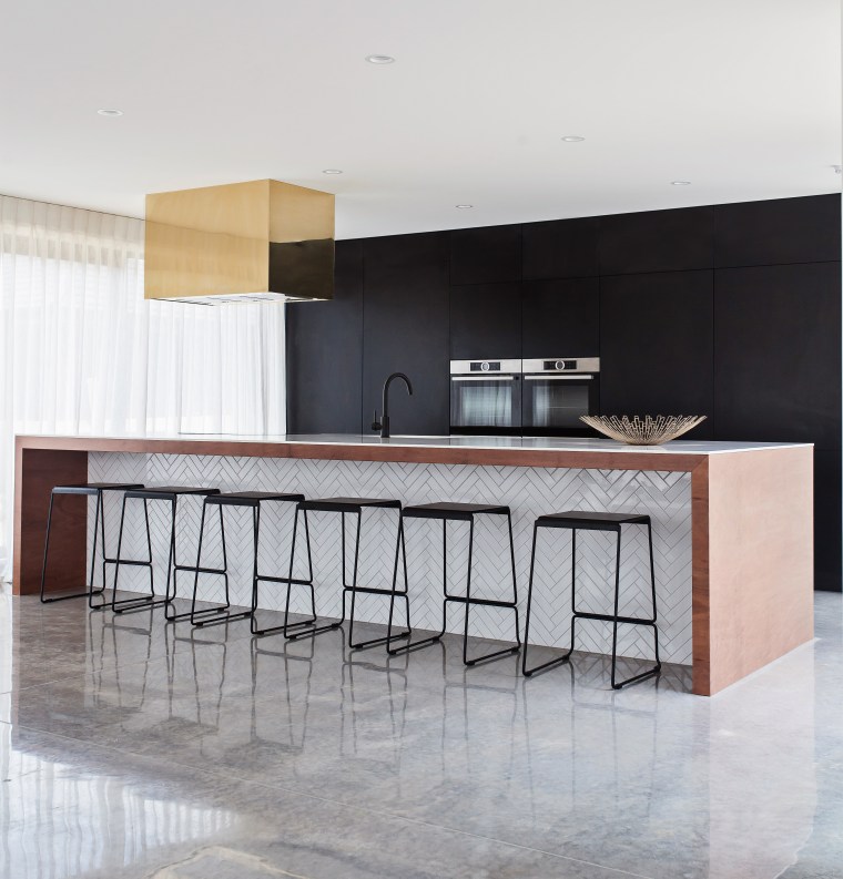 In this kitchen, by owner and designer Annika chair, countertop, floor, flooring, furniture, interior design, kitchen, product design, table, gray, white