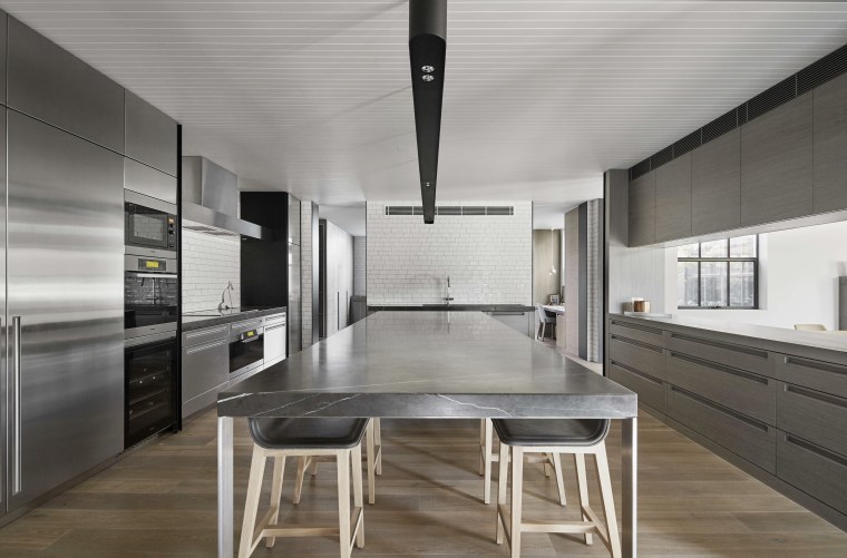 The elongated island in this kitchen by BE architecture, countertop, floor, interior design, kitchen, gray