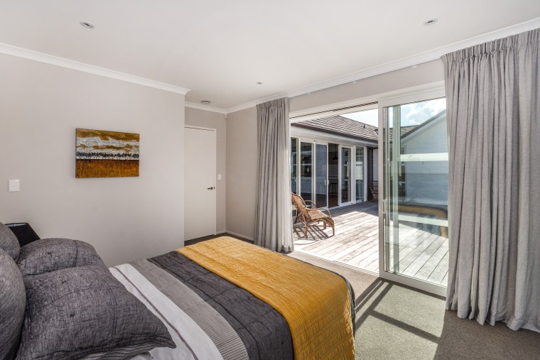 The main bedroom, set at the end of bedroom, ceiling, estate, interior design, property, real estate, room, window, gray