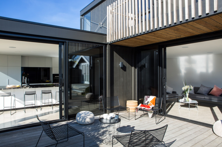 In keeping with Boxs preference for flexible, preconceived apartment, architecture, house, interior design, living room, patio, penthouse apartment, property, real estate, window, black