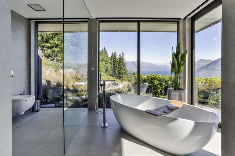 This sculptural tub sits in its own glass architecture, house, interior design, real estate, window, gray