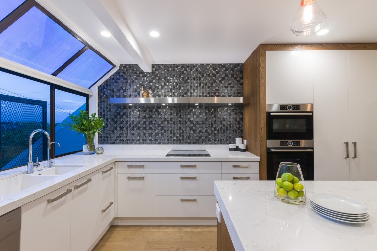 With removal of walls, this renovation by Kira countertop, interior design, kitchen, real estate, gray