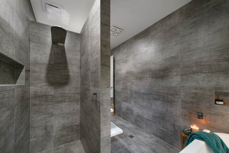 Both toilet and shower have their own niches architecture, bathroom, concrete, daylighting, floor, flooring, interior design, tile, wall, gray