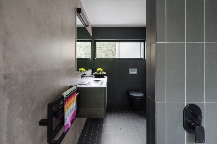 This private master ensuite addition is finished in architecture, bathroom, bathroom accessory, floor, interior design, product design, room, tile, gray, black