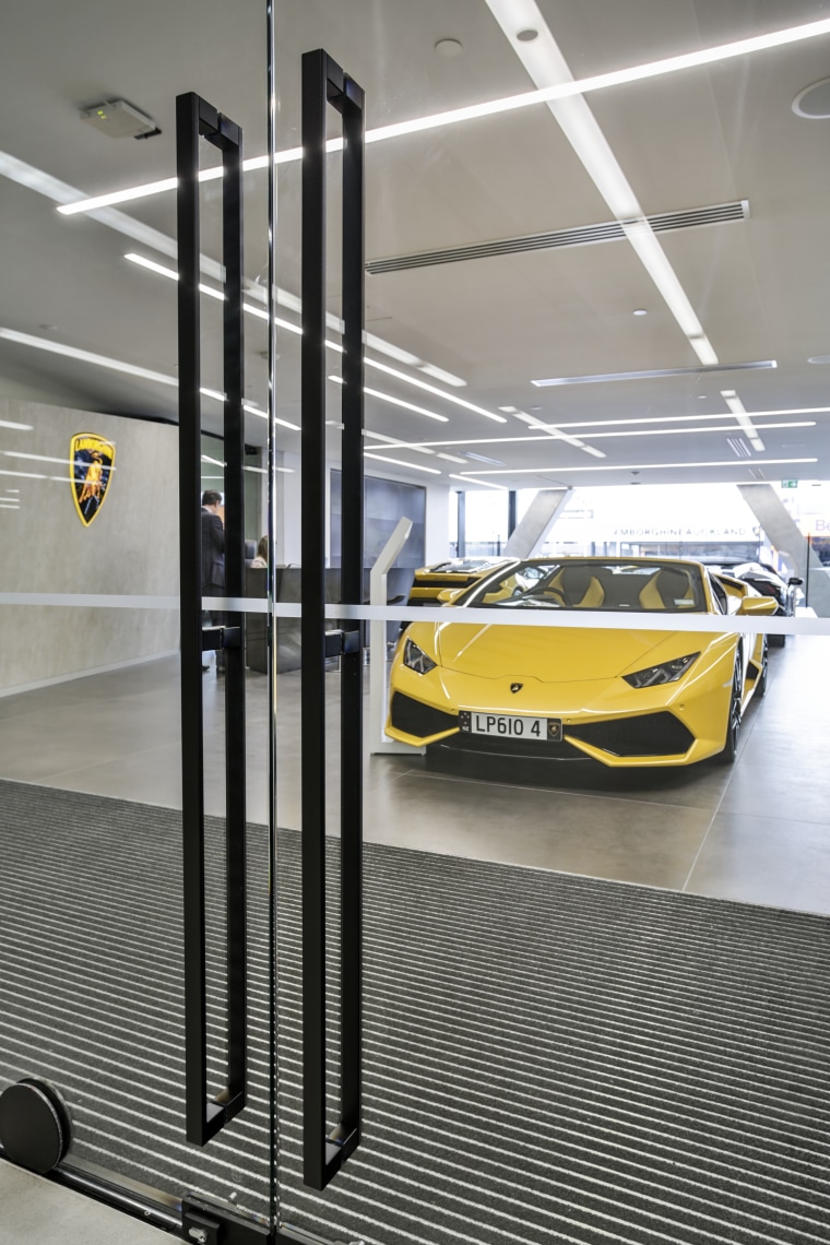 Whats in a touch? Well, quite a lot automotive design, car, car dealership, luxury vehicle, motor vehicle, sports car, vehicle, yellow, gray