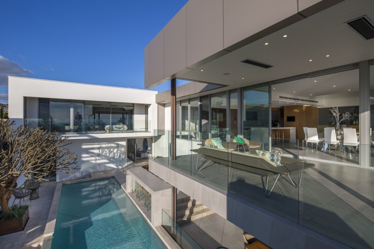 Internal landscape protected from the wind at apartment, architecture, condominium, estate, home, house, mixed use, penthouse apartment, property, real estate, swimming pool, water, gray, black