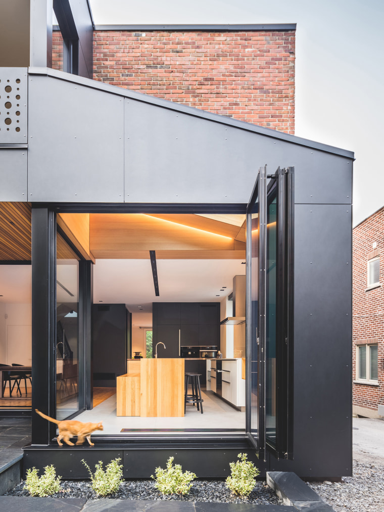 Bifold glass doors in this small addition to architecture, facade, house, gray