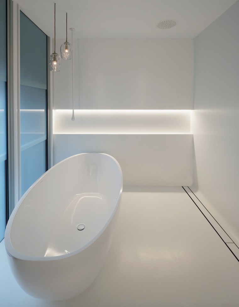 Coloured glass frameless sash windows open this bathroom architecture, bathroom, bathtub, ceramic, floor, flooring, glass, house, interior design, material property, plumbing fixture, property, room, tap, tile, toilet, wall, gray