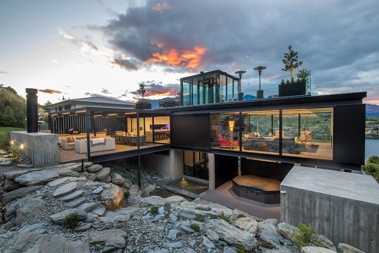Read the full story architecture, building, design, estate, facade, home, house, interior design, landscape, property, real estate, residential area, room, sky, tree, gray, black