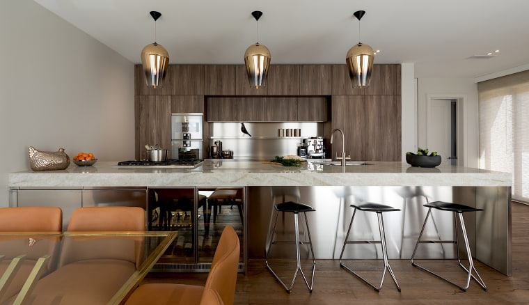 Stainless steel is a prominent surface in this bar stool, building, cabinetry, ceiling, countertop, design, dining room, floor, flooring, furniture, hardwood, home, house, interior design, kitchen, laminate flooring, light fixture, property, real estate, room, stool, table, wood, wood flooring, gray, brown