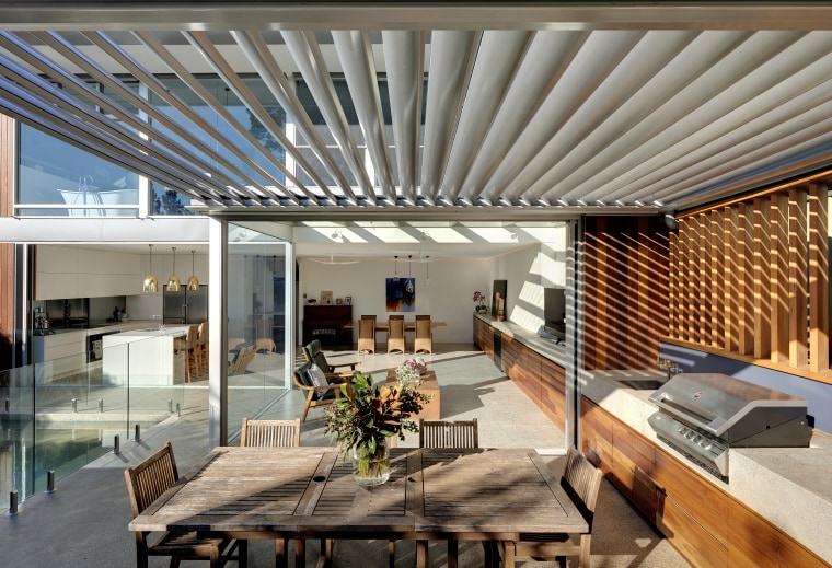 The new 220 Slimline Retract Roof louvres include apartment, architecture, building, ceiling, daylighting, design, floor, furniture, home, house, interior design, living room, loft, mixed-use, property, real estate, roof, room, shade, gray