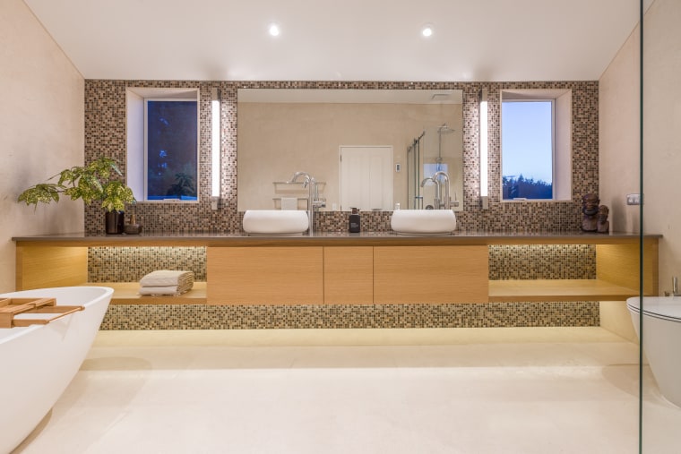 The his-and-her vanities are positioned symmetrically to the architecture, bathroom, floor, interior design, real estate, room, gray