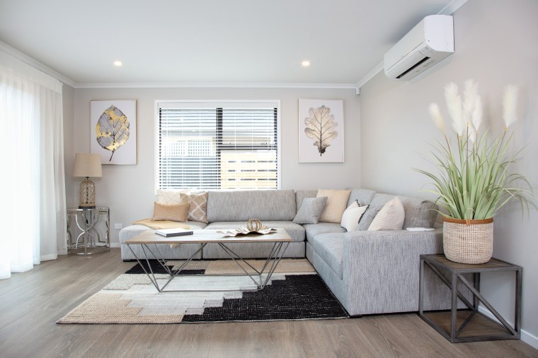 With floor-to-ceiling windows, smart engineered wood floors and building, ceiling, coffee table, couch, floor, flooring, furniture, hardwood, home, house, interior design, laminate flooring, living room, property, real estate, room, sofa bed, studio couch, table, wall, wood, wood flooring, gray, white