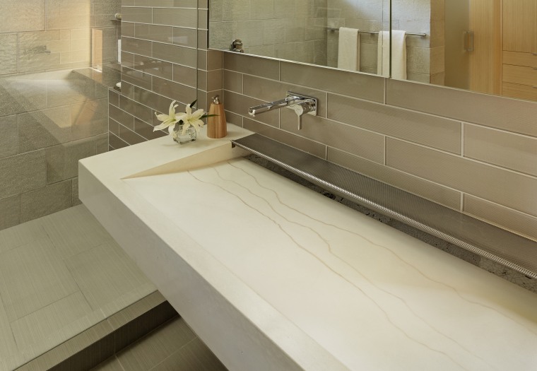 This custom-designed sink was cast in glass fibre bathroom, countertop, tiled floor, custom made sink, tap, Cheng Design