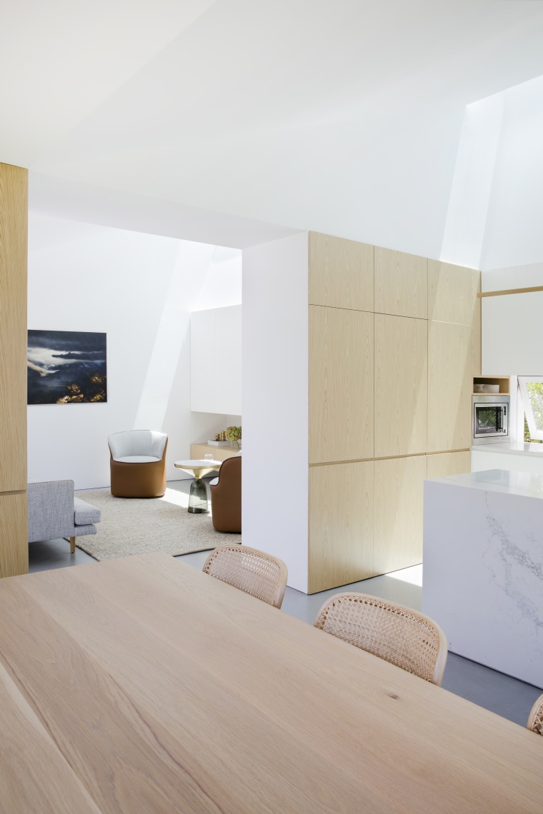 Shafts of sunlight on the walls indicate the architecture, home, house, interior design, wood, timber Table, Studio prineas