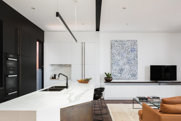 A bronze, white and black palette in this interior design, kitchen, living room, benchtop, CDK Stone, Biji Architects