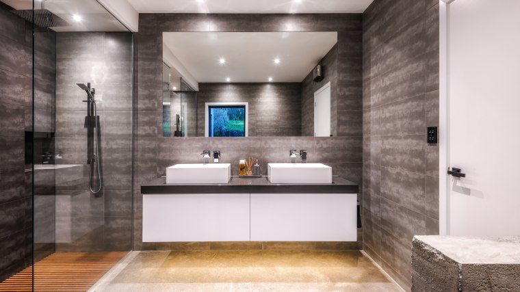 Designer Kirsty Davis adjusted the initial plan for bathroom, interior design, vanity, Kirsty Davis, master suite, grey tiles, double shower