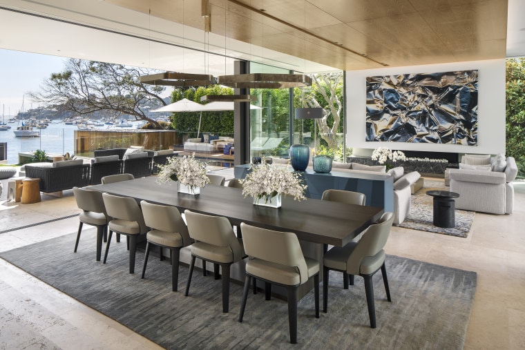 Large, slim framed glass panels open up this chair, dining room, furniture, interior design, patio, table, SAOTA