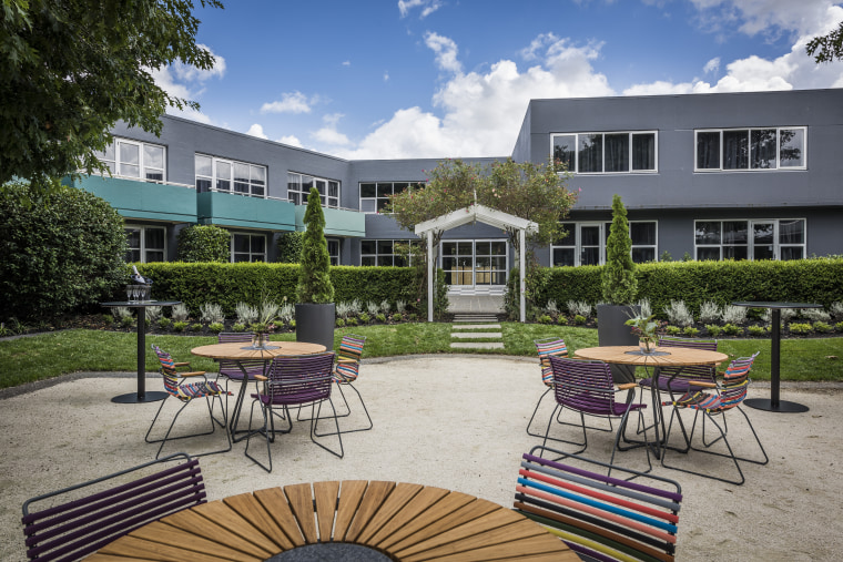 Ready to take flight – the exterior walls apartment, backyard, cottage, courtyard, estate, home, house, mixed use, outdoor structure, property, real estate, residential area, gray