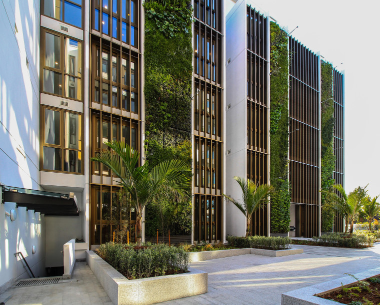 A 330m² lush feature wall earned the high-end apartment, residences, architecture, building, commercial building, condominium, corporate headquarters, facade, headquarters, property, urban design, St Marks Residences, Homestar Innovation, Dominion constructors