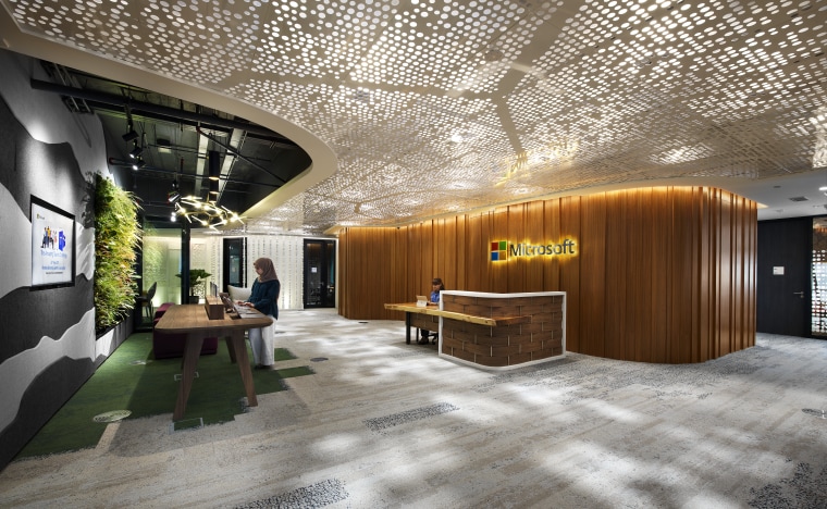 The reception desk in the new Microsoft KL architecture, ceiling, interior design, lobby, brown