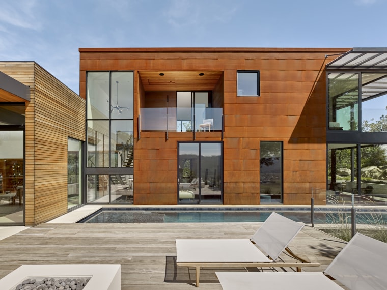 In contrast to the wood box that contains architecture, design, facade, home, house, timber cladding, pool, de Vito Architecture + Construction