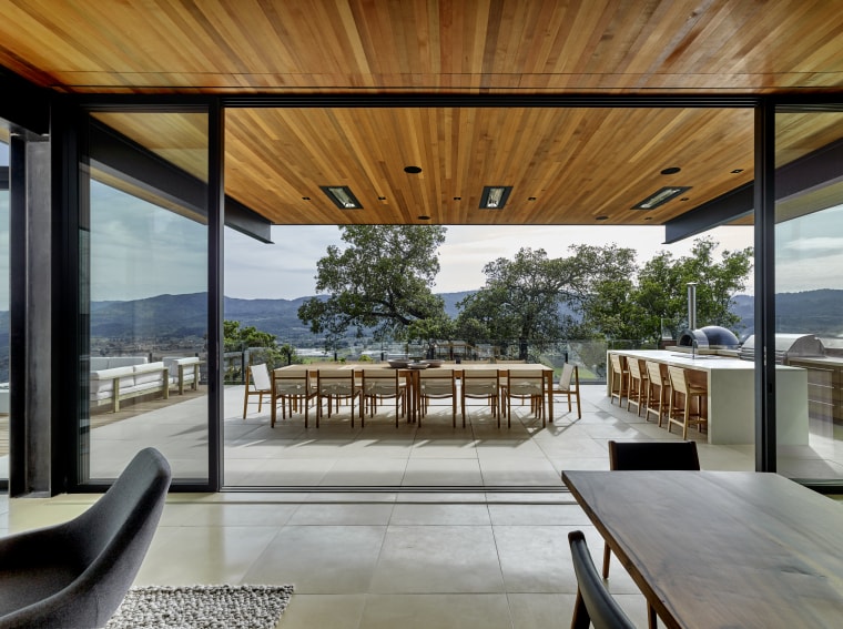 Views across the valley predominate in the living architecture, deck, design, floor, tiles, furniture, home, house, interior design, living room, patio, porch, shade, table, window, wood, tiles, floor, de Vito Design + construction