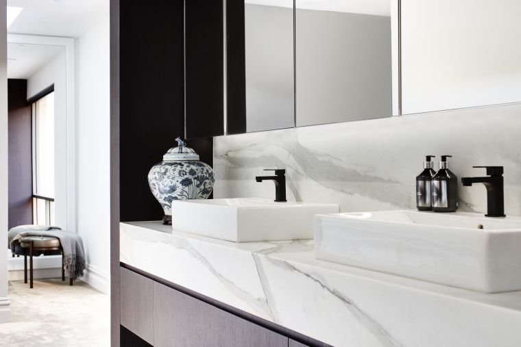 Traditional urn, modern black tapware – this is architecture, bathroom, bathroom accessory, bathroom cabinet, black-and-white, countertop, furniture, interior design, marble, material property, room, sink, table, tap, tile, white, gray