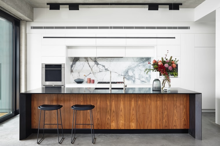 A slender granite island benchtop with waterfall ends architecture, building, cabinetry, countertop, furniture, home, house, interior design, kitchen, material property, property, room, table, white