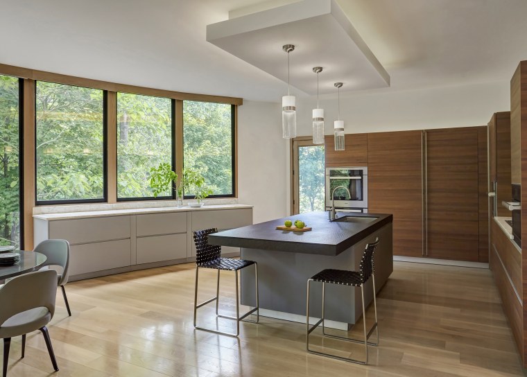 While this kitchen renovation by architect Lenore Weiss architecture, building, cabinetry, ceiling, countertop, daylighting, dining room, floor, flooring, furniture, hardwood, home, house, interior design, kitchen, laminate flooring, living room, property, real estate, room, table, window, wood, wood flooring, gray, brown