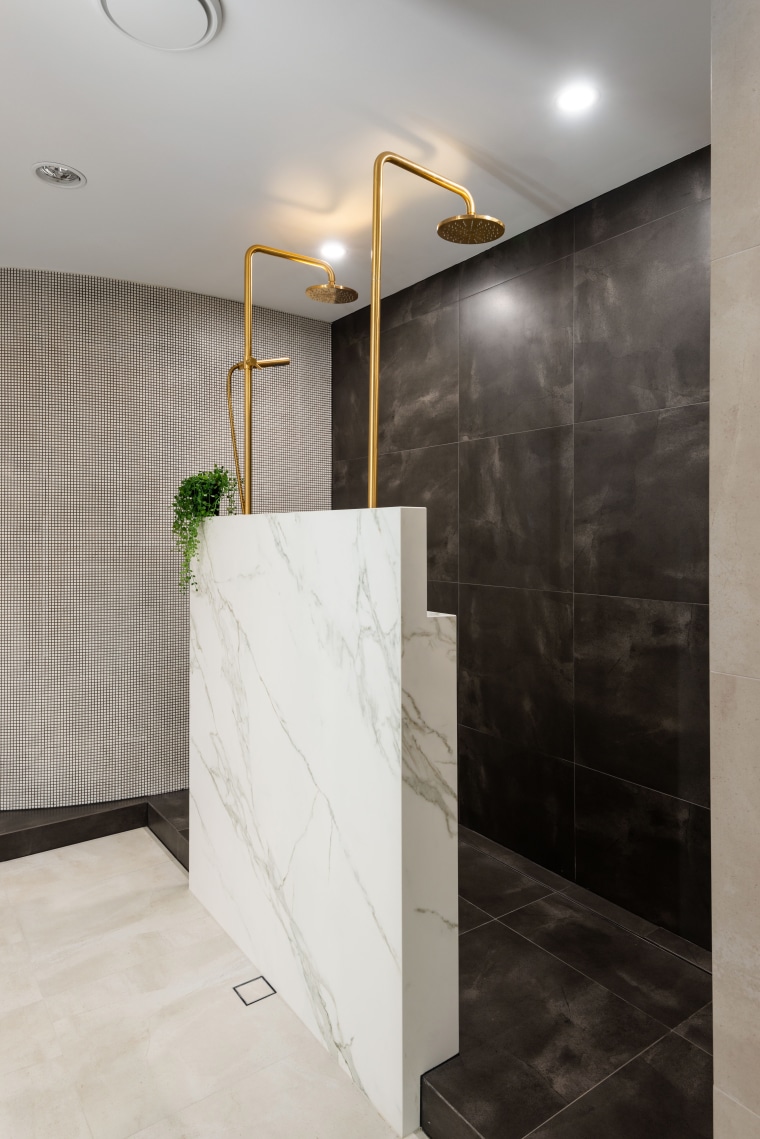 In further pursuit of lightness for this master architecture, bathroom, floor, flooring, glass, interior design, marble, material property, property, room, tile, wall, gray, black