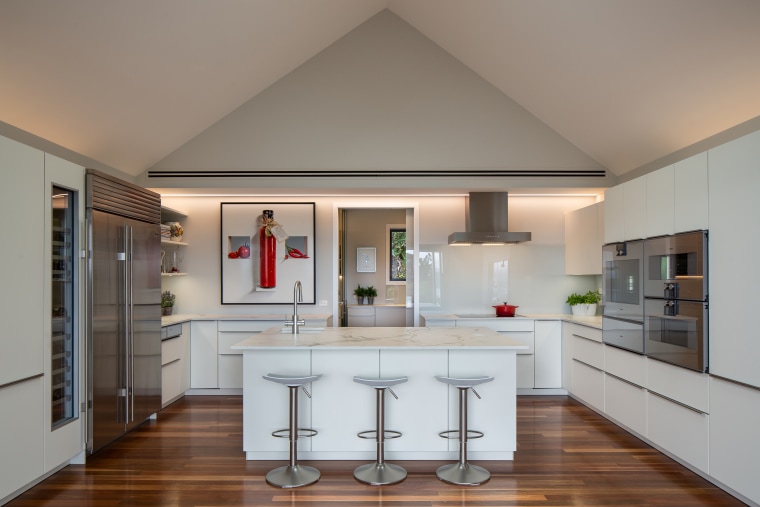 With the original ceiling stripped out to gain architecture, building, cabinetry, ceiling, countertop, estate, floor, flooring, furniture, hardwood, home, house, interior design, kitchen, property, real estate, room, table, wood flooring, gray