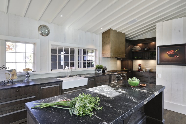 This kitchen is spacious and easy to use gray, black