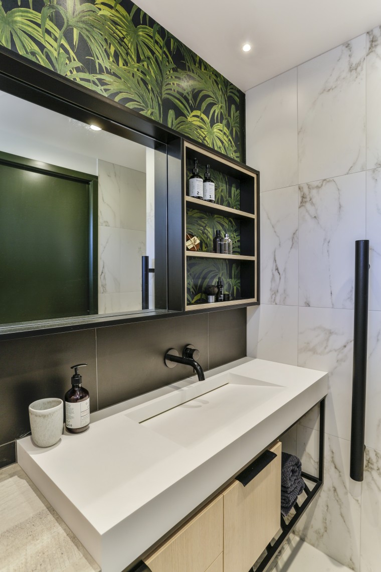 Wood, white engineered stone, black steel, black splashback gray
