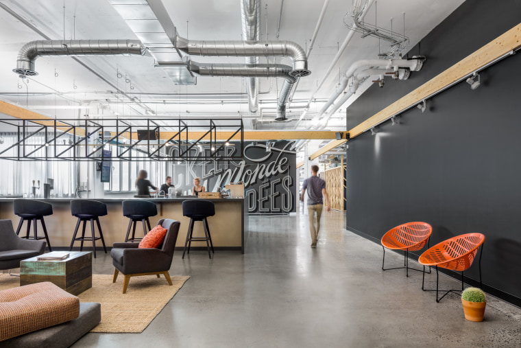 Instead of a formal reception area, a large architecture, building, floor, furniture, interior design, loft, office, room, lounge, Attraction Mediatable, gray