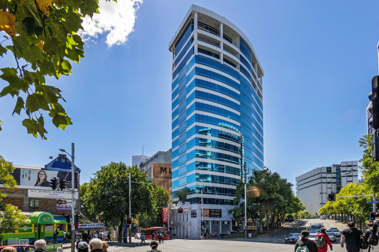 While the original office block’s facade at 396 apartment, architecture, building, city, commercial building, condominium, corporate headquarters, daytime, downtown, human settlement, infrastructure, landmark, metropolis, metropolitan area, mixed-use, neighbourhood, photography, plaza, property, real estate, residential area, road, sky, skyscraper, street, tourism, tower, tower block, town, tree, urban area, urban design, teal