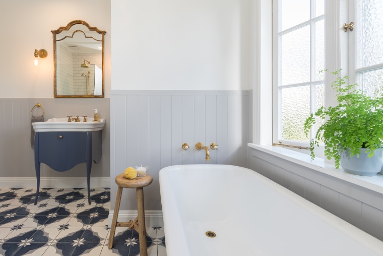 The room has both a masculine and feminine architecture, bathroom, bathtub, building, estate, floor, flooring, furniture, home, house, interior design, property, real estate, room, tap, tile, white, masculine, feminine