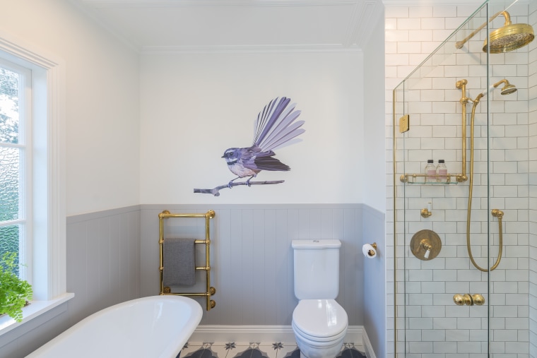 Fleeting fantail – this colourful decal adds a bathroom, bird, ceiling, floor, home, house, interior design, property, purple, room, tile, wall, wallpaper, gray, decal, crackle glaze, crackled tile