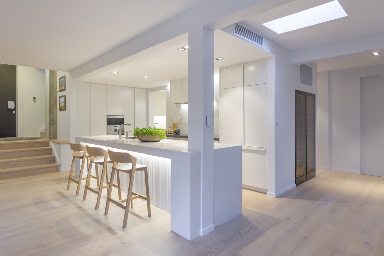 One of the challenges was to ensure the apartment, architecture, building, ceiling, daylighting, floor, flooring, furniture, hardwood, home, house, interior design, kitchen, loft, property, real estate, room, table, wood, wood flooring, gray
