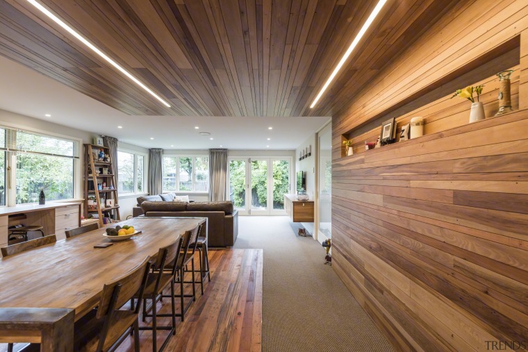 See more of this kitchen hereDesigned by ceiling, daylighting, estate, floor, flooring, hardwood, home, house, interior design, living room, property, real estate, wood, wood flooring, brown