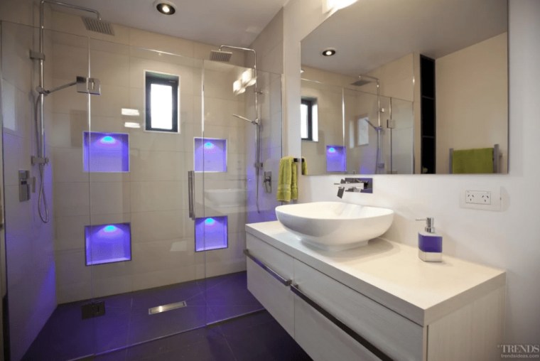 With LED strip lights hidden in the nooks bathroom, home, interior design, purple, real estate, room, sink, gray