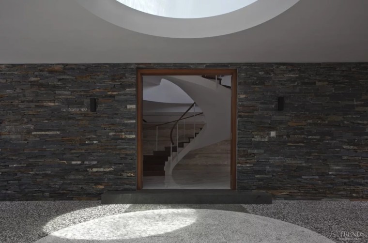 The oculus allows a round patch of sunlight architecture, building, daylighting, floor, flooring, house, interior design, property, room, tile, wall, black, gray