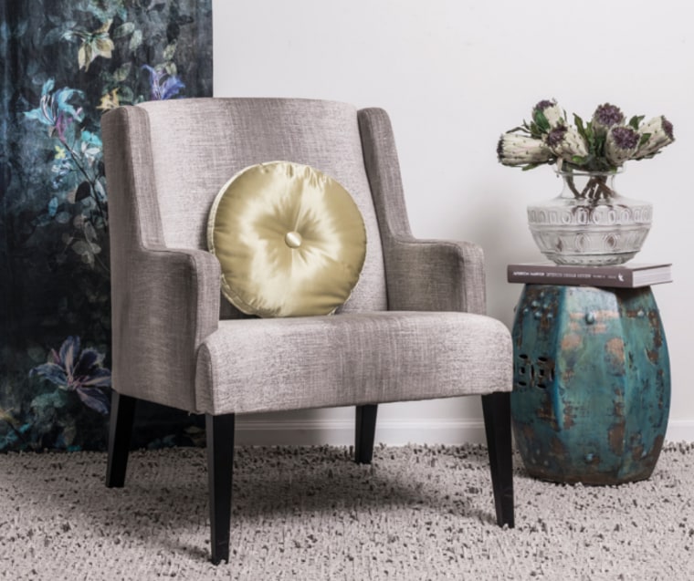 Getting the balance is crucial when designing for chair, club chair, coffee table, couch, end table, furniture, interior design, living room, plant, room, table, gray