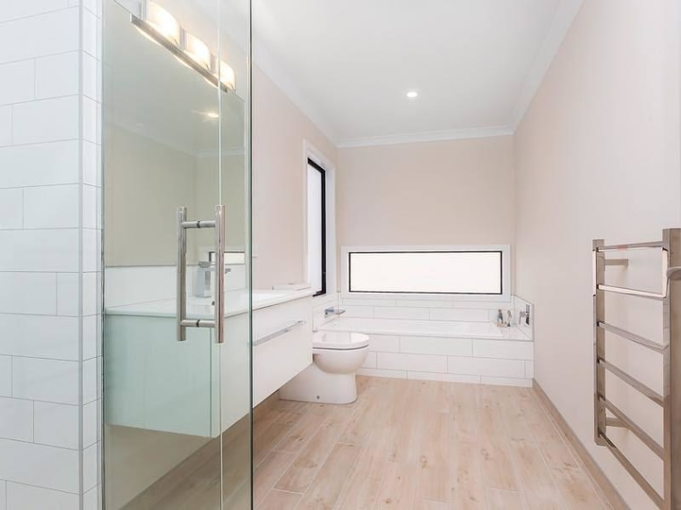 Slow-flow tapware can save on water while solar apartment, architecture, bathroom, building, ceiling, daylighting, floor, flooring, furniture, house, interior design, property, real estate, room, tile, gray