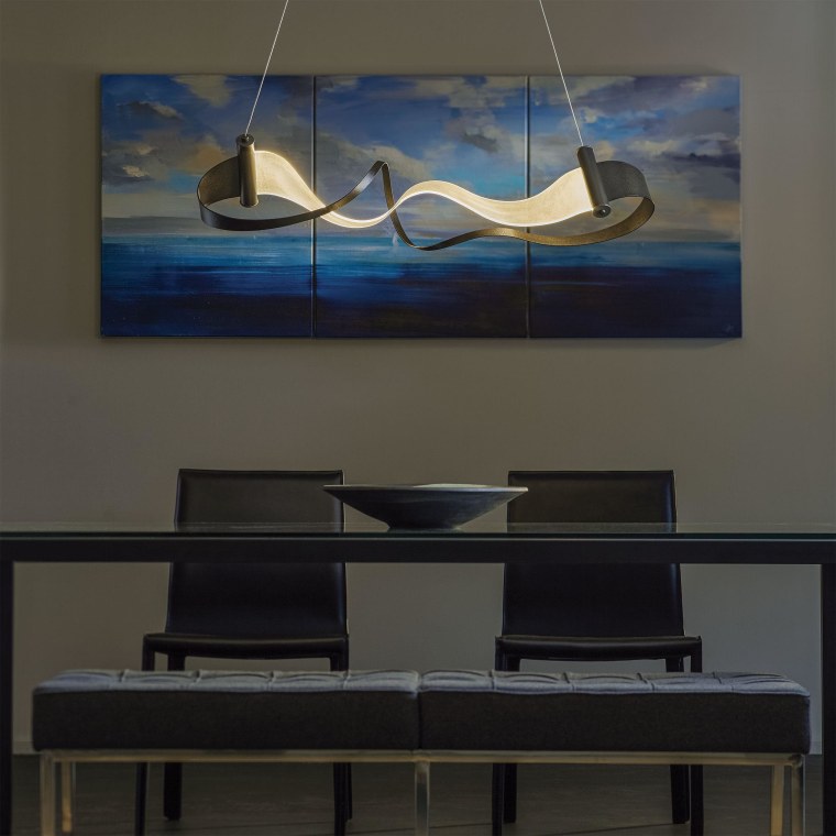 The Zephyr is a playful combination of hand glass, interior design, lamp, light fixture, lighting, lighting accessory, modern art, painting, product design, black, gray